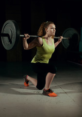 Woman Lifting Weight. Crossfit.