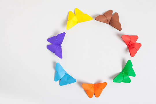 colourful origami butterfly paper on withe background.
