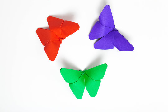 Origami butterfly on white background.