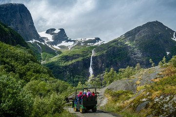 Briksdalsbreen glacier troll car excursion. Briksdal, Norway.