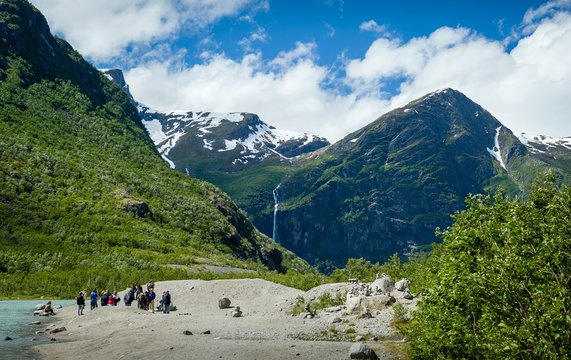 Tourists at Briksdalsbreen glacier hike finish, Norway