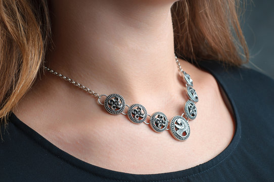 silver ethnic jewelry necklace on woman