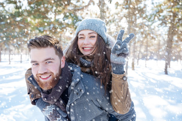 Fototapeta premium Happy couple walking in winter park