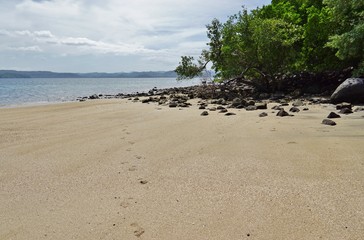 The volcanic Playa Sombrero Obscuro beach in Peninsula Papagayo in Guanacaste, Costa Rica