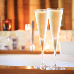 Two glasses of champagne near jacuzzi. Valentines background. Ro