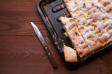 apple pie charlotte on the wooden table