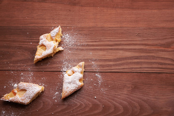 piece of apple pie on the table copy space