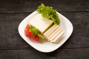 mozzarella cheese on a table bacground