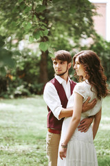 Wedding couple embracing and dancing at the nature