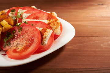 salad with tomato and cheese fries