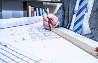 View of architect working in the office.