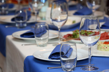 serving banquet table in a restaurant in blue and white style