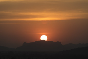 sunset over the  mountain