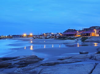 Fototapeta na wymiar Uruguay, Rocha Department, Punta del Diablo, Twilight view of the Fisherman’s Beach Los Botes.