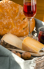 Ukranian cheeses made from cow milk: Tsysarskiy )aka French Tomme) and Cimbor, served with rose wine, italian bread fougasse, cherry and basil sauce and walnuts