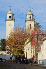 Fototapeta na wymiar Uruguay, Colonia Department, Colonia del Sacramento, View towards the towers of the Basilica of the Holy Sacrament.