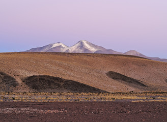 Bolivia, Potosi Departmant, Sur Lipez Province, Eduardo Avaroa Andean Fauna National Reserve, Sol de Manana, Nightfall view towards Volcano Uturuncu.
