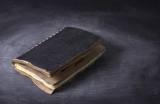 Ancient notebook open on the wood texture background, Diary with