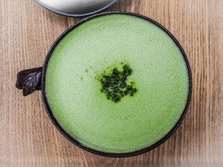 Latte green tea coffee from Osulloc tea museum, the famous green tea shop in Jeju island, South Korea.