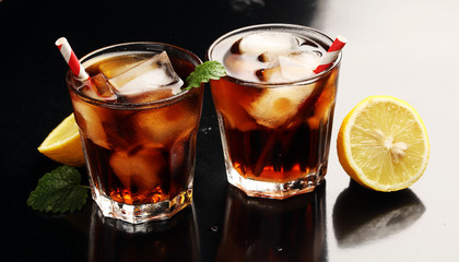 Cola soda drink in large glass, coca cola with bubbles 