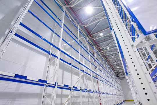Large cold distribution warehouse with high empty shelves