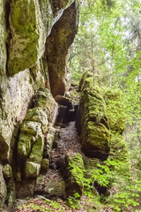 Group of moss covered rock formations