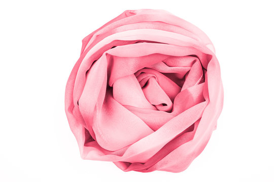 Pink silk scarf isolated on white background.