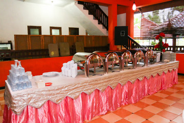Catering wedding or hotel breakfast service with heater on metal buffet line event celebration