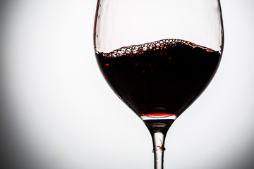 Red wine in wineglass.