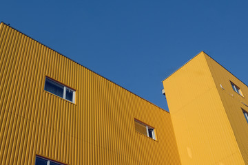 Contour of sky above yellow building