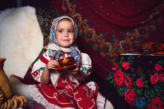 Adorable Toddler Girl  Wearing National Dress On Tea Party