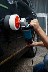 Fototapeta premium polishing black car