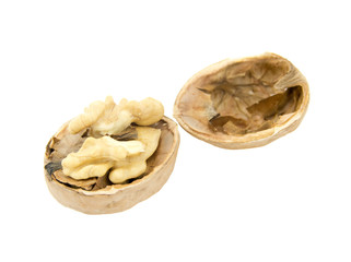 walnut and a cracked walnut isolated on the white background