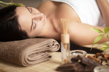 Obraz na płótnie Canvas Beautiful woman having relaxing in spa massage salon.