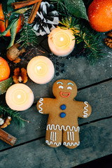 Christmas composition with gingerbread man Tangerines, Pine cone