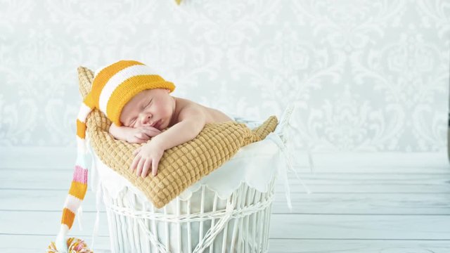 Little, newborn child having a nap