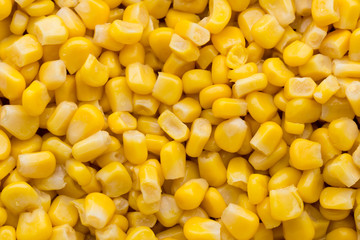 Bulk of yellow corn grains texture.