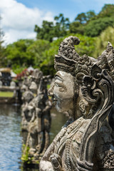 Fototapeta na wymiar Statue in Water Palace of Tirta Gangga East Bali, Indonesia