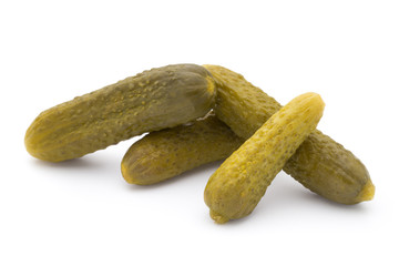 Marinated pickled cucumbers isolated on the white.