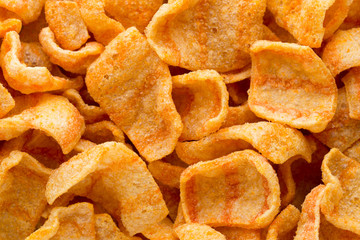Delicious potato chips closeup becon meat.