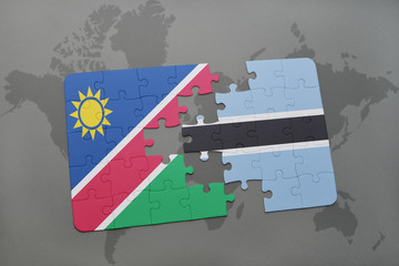 puzzle with the national flag of namibia and botswana on a world map