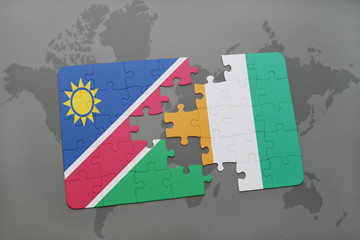 puzzle with the national flag of namibia and cote divoire on a world map
