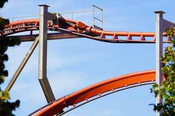 Rollercoaster against blue sky in the evening