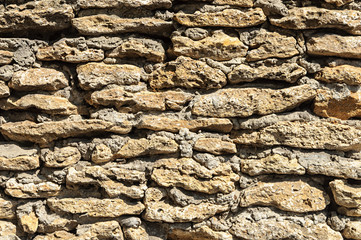 Wall of rough stones shell