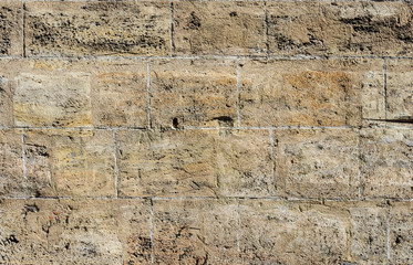 Wall of smooth stones shell