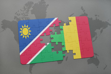Fototapeta na wymiar puzzle with the national flag of namibia and mali on a world map