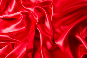 Obraz premium Sensuous Smooth Red Satin background topview