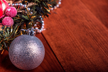 Christmas decoration and christmas ball from christmas wreath on wooden background