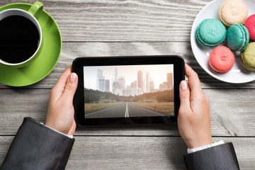 Businesswoman having coffee break