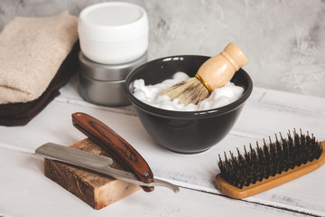 Wooden desktop with tools for shaving beards